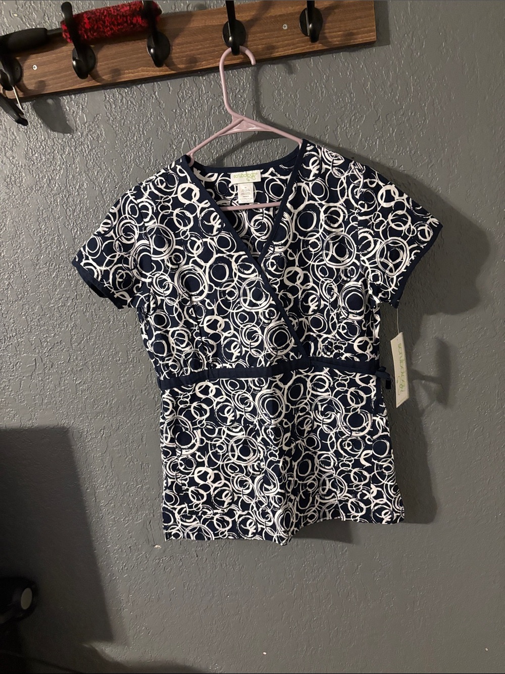 New with tags Women’s size S  Navy and White Printed Wrap-Style scrub top